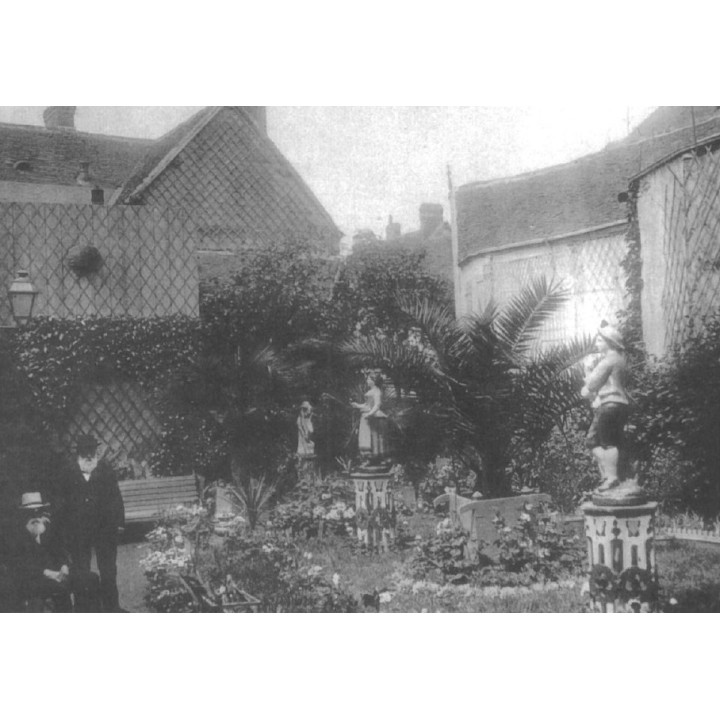Amiot in the garden - postcard